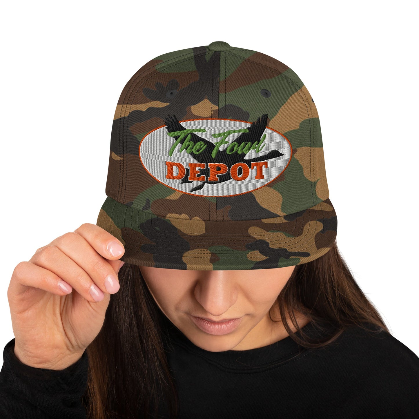 This hat is structured with a classic fit, flat brim, and full buckram. The adjustable snap closure makes it a comfortable, one-size-fits-most hat. • 80% acrylic, 20% wool • Green Camo is 60% cotton, 40% polyester • Structured, 6-panel, high-profile • 6 e