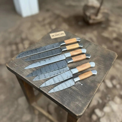 7-Piece Handmade Chef Knife Set — Pattern-Welded Damascus Blades with Natural Wood Handles (Professional Kitchen Set)