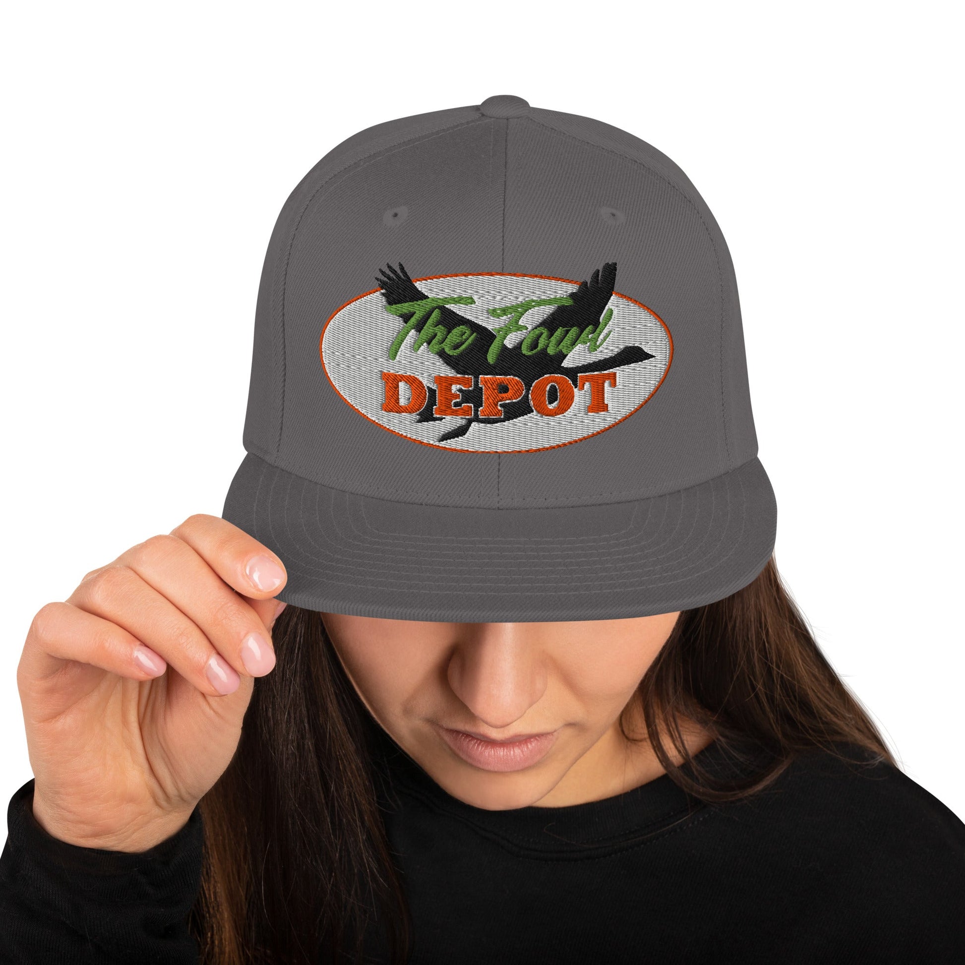 This hat is structured with a classic fit, flat brim, and full buckram. The adjustable snap closure makes it a comfortable, one-size-fits-most hat. • 80% acrylic, 20% wool • Green Camo is 60% cotton, 40% polyester • Structured, 6-panel, high-profile • 6 e